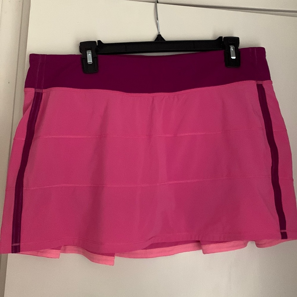 12 Tall. Pink and purple Lululemon tennis skirt.